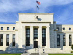 How does the Federal Reserve influence the economy and markets?